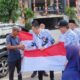 Wujud Bela Negara Non-Militer, PGRI Sum-Sel Gelar Aksi Bagikan Bendera Merah Putih